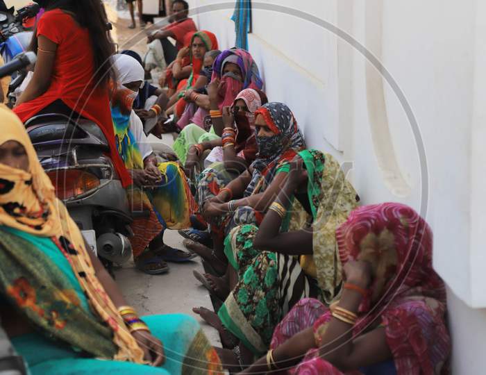 Women Waiting For Ration  At A Government Ration Shop During Nationwide Lockdown In Wake Of Coronavirus Or COVID-19  Pandemic In Prayagraj, March 12, 2020.