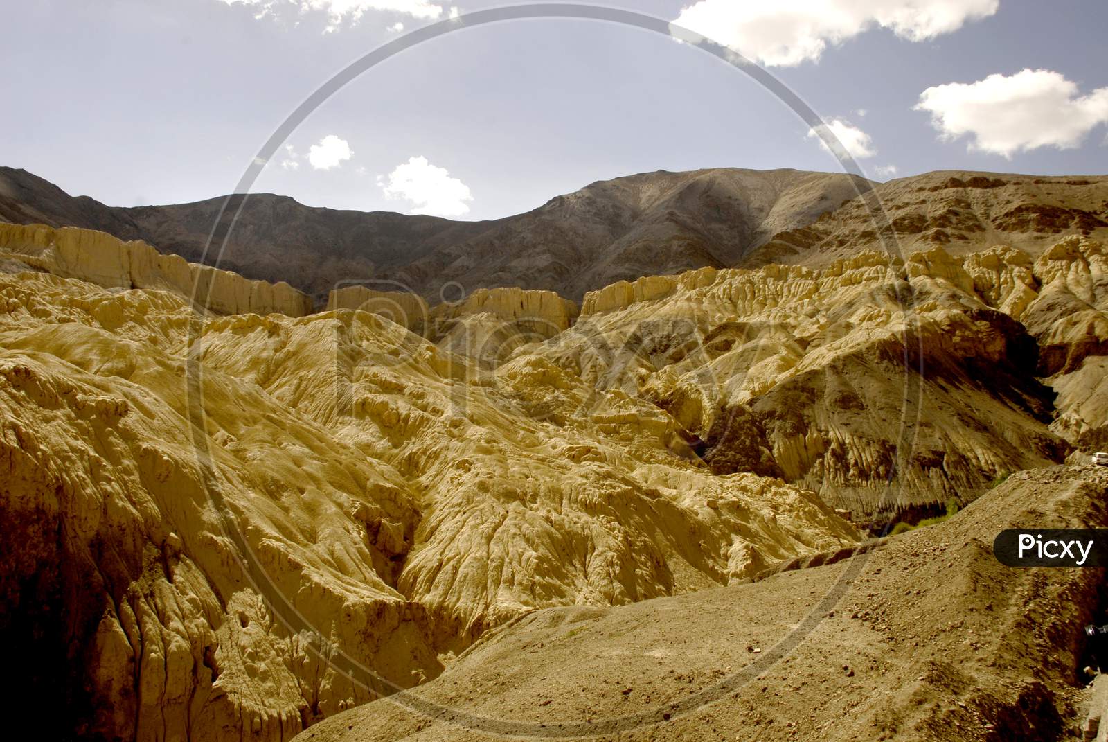 Roads in Sand Terrains Or Mountains With Blue Sky Composition In Ladakh