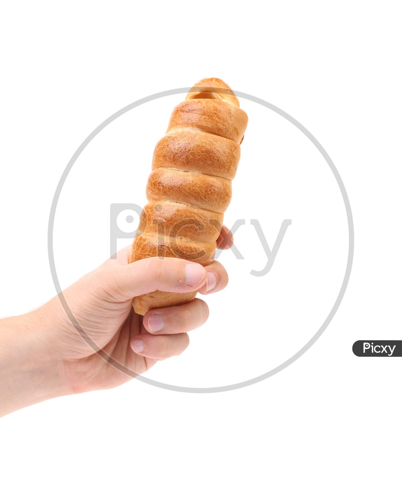 Hand Holds Hot Dog Baked. Isolated On A White Background.