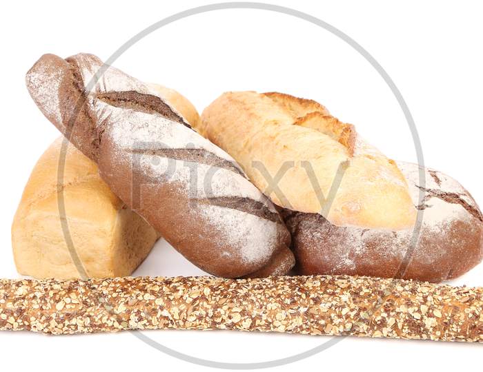 Stack Of White And Brown Bread. Isolated On A White Background.