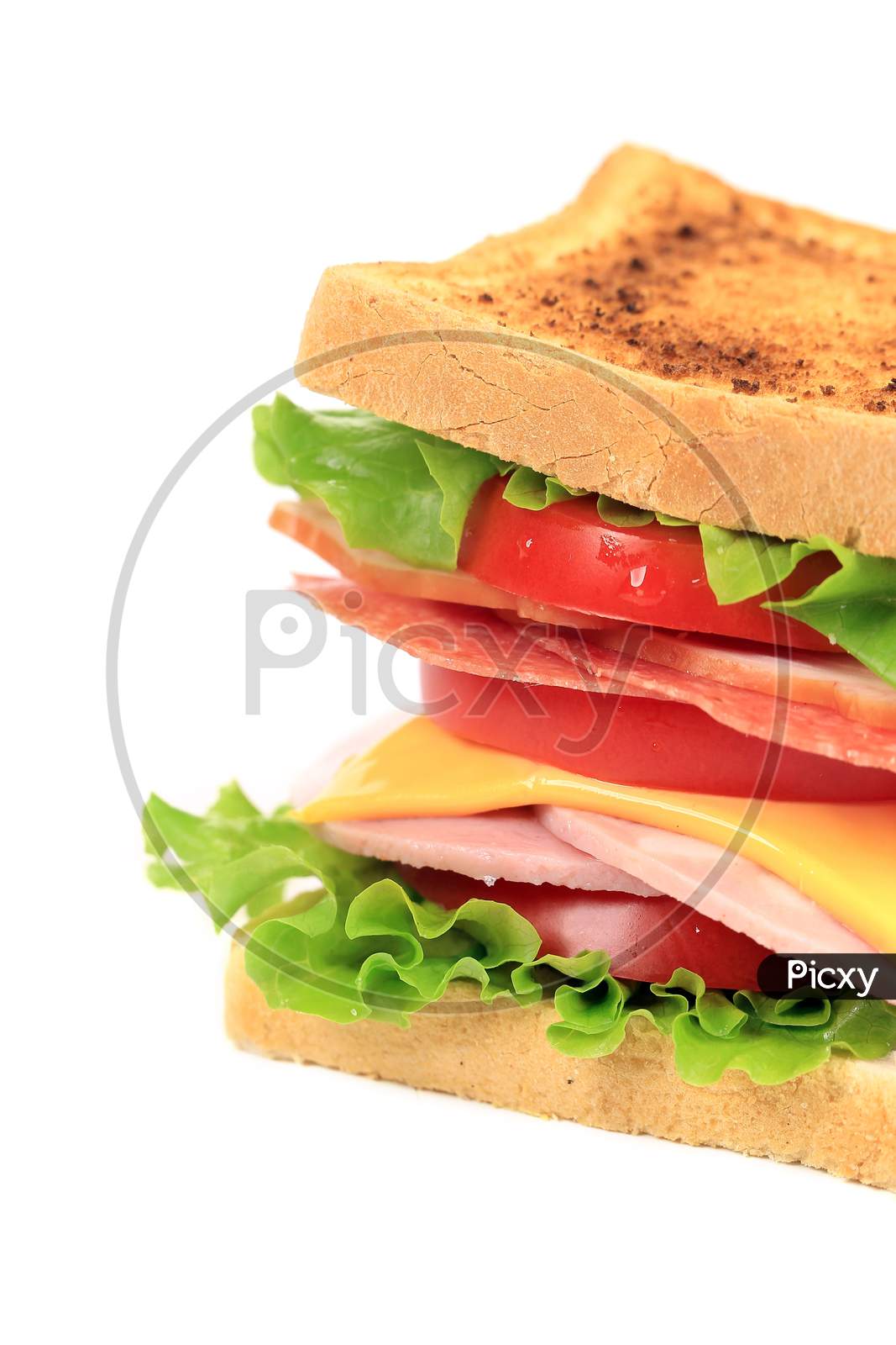 Sandwich With Bacon And Vegetables. Whole Background.
