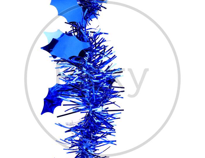 Christmas Blue Tinsel With Stars. Vertical. Isolated On A White Background.