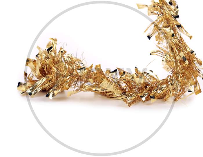 Christmas Golden Tinsel. Isolated On A White Background.