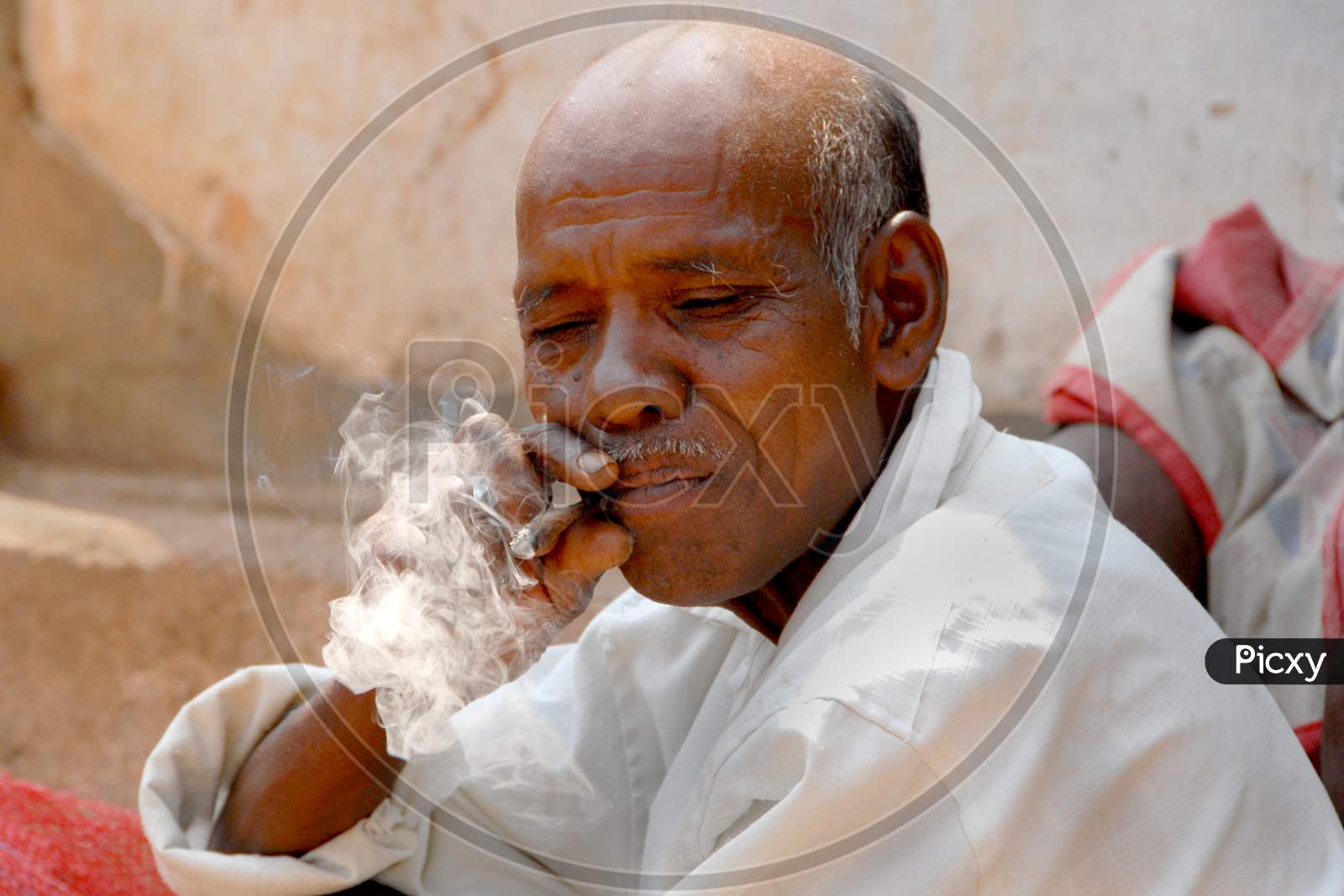 Indian Man Smoking Tobacco