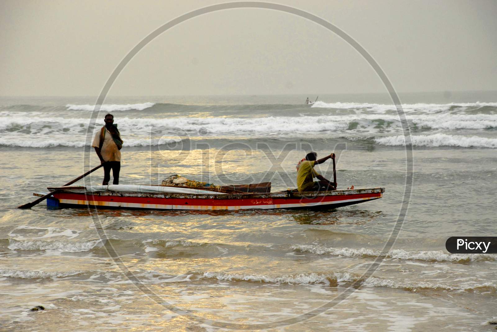 fisherman On Tides Over a Sea Going For Fishing