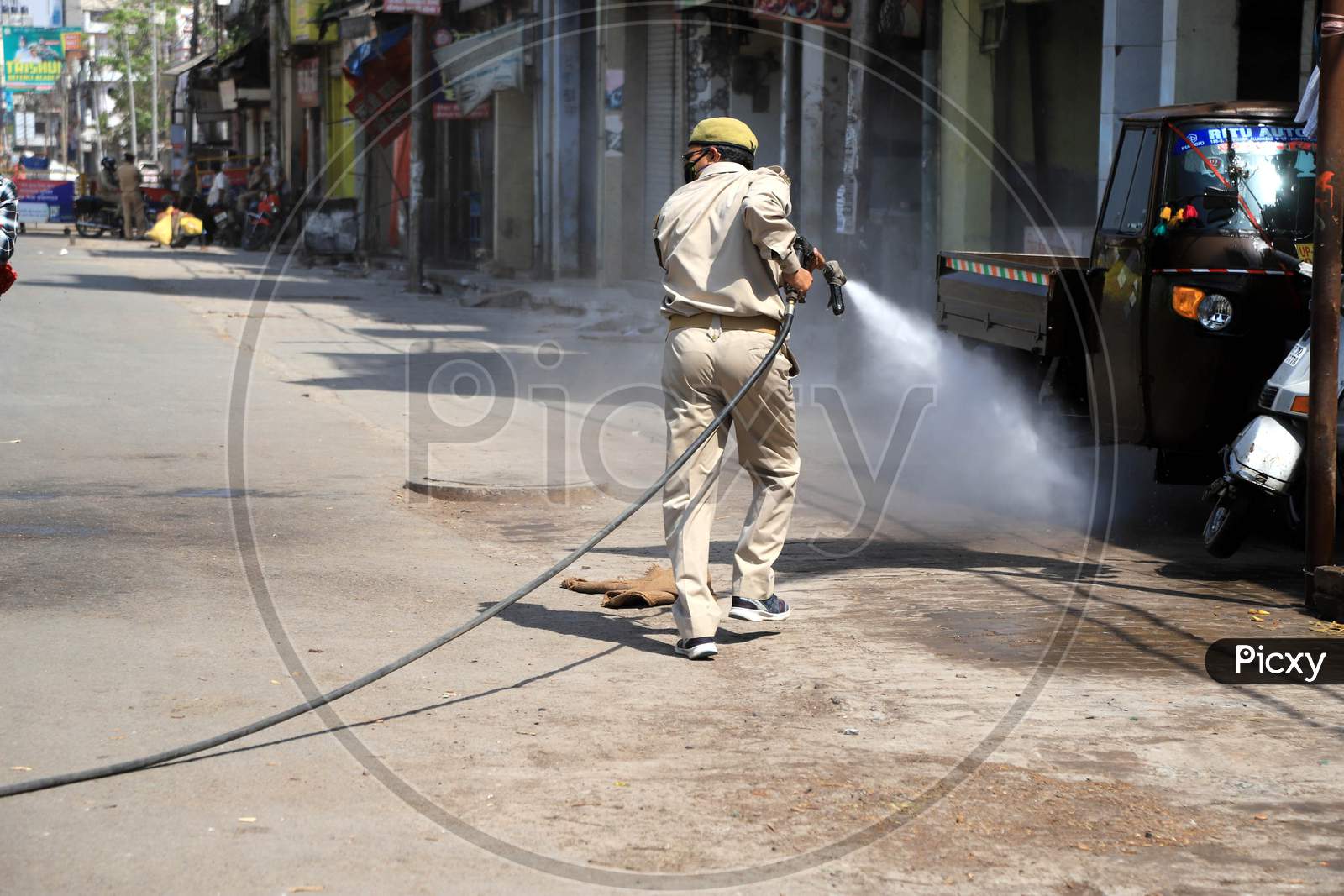 Firefighter Spray Disinfectant At Corona Positive Hot Spot Area During Nationwide Lockdown In Wake Of Coronavirus or covid-19 Pandemic In Prayagraj, March 13, 2020.