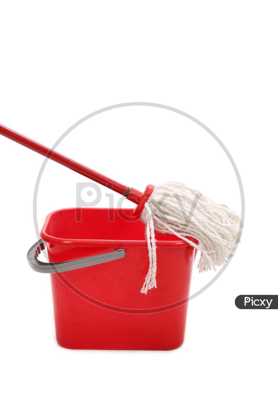 Red Bucket With Cleaning Mop. Isolated On A White Background.