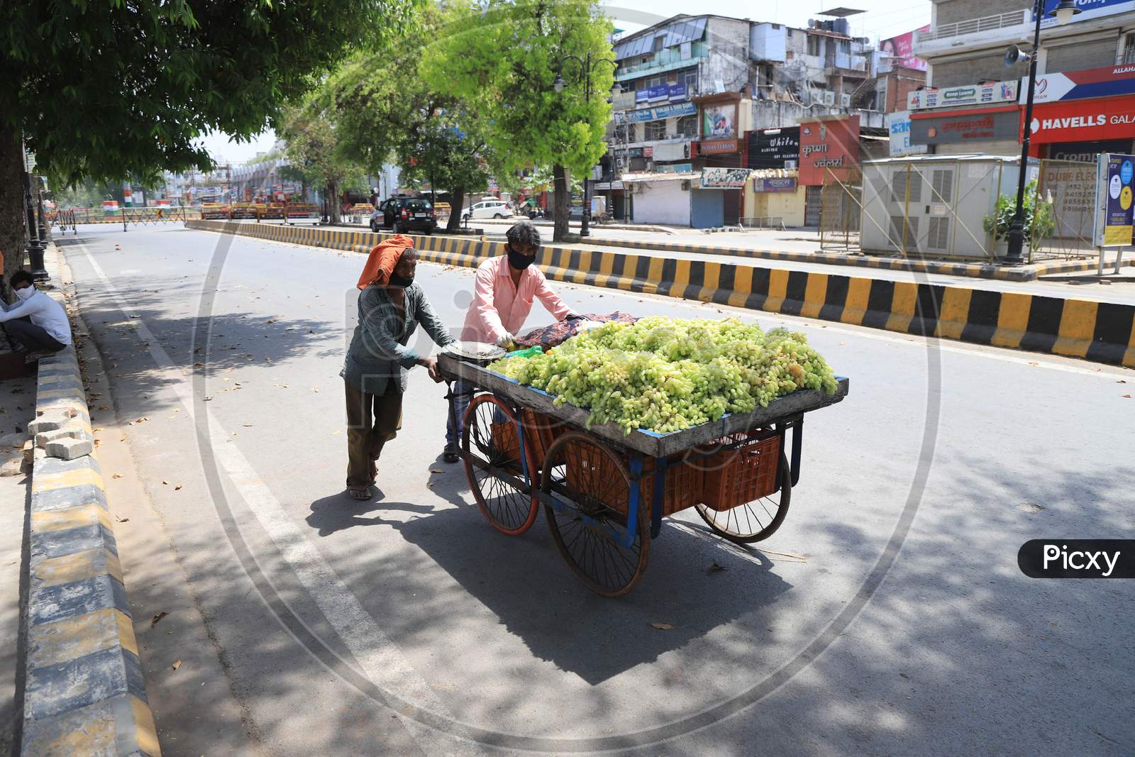 Vendors Selling Fruits On The Empty Road During Nationwide Lockdown In Wake Of Coronavirus or covid-19 Pandemic In Prayagraj, March 13, 2020