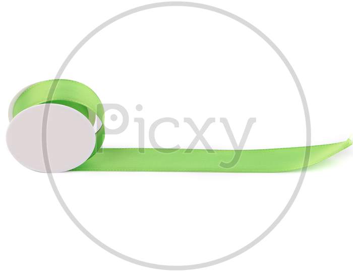 Green Silk Decorative Ribbon. Isolated On A White Background.