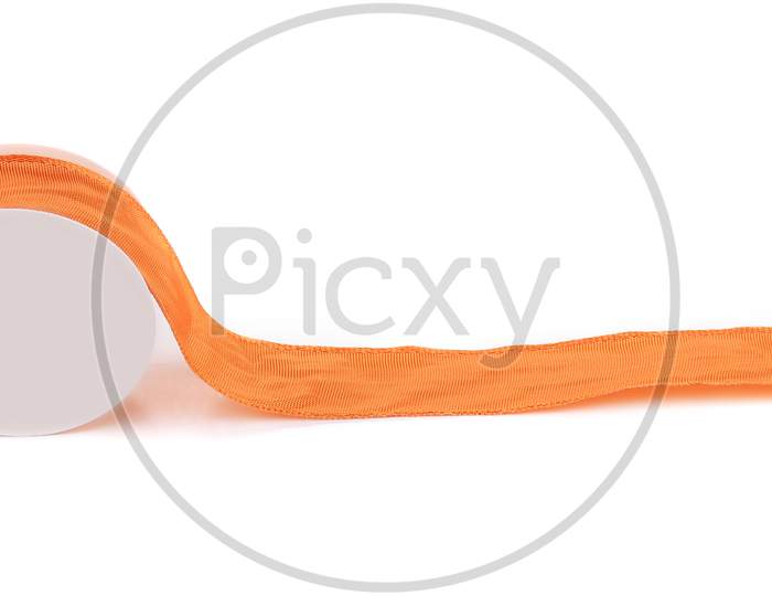 Orange Silk Decorative Ribbon. Isolated On A White Background.