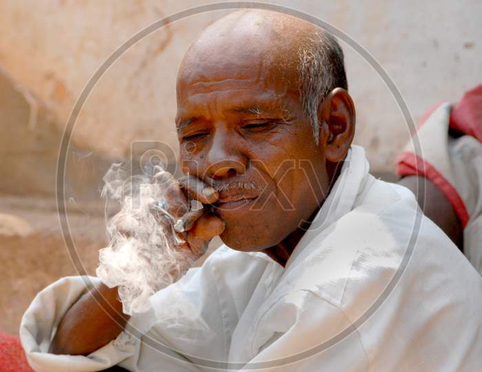 Indian Man Smoking Tobacco