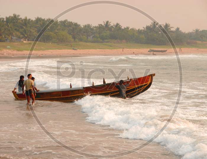 Fisherman Going To Fishing in Boats On Tides Over a Sea