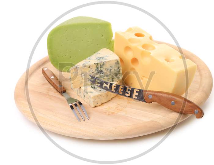 Various Types Of Cheeses On Wood. Isolated On A White Background.