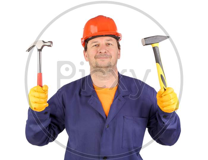 Worker In Hard Hat Holding Hammers. Isolated On A White Background.