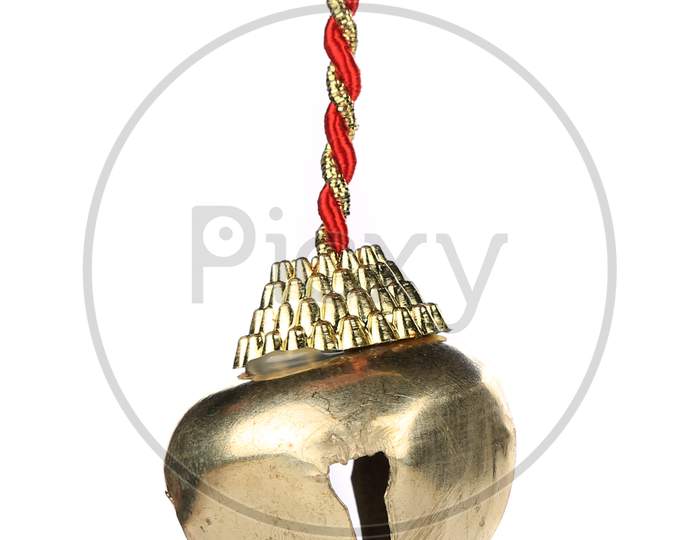 Golden Jingle Bell On A Rope. Isolated On A White Background.