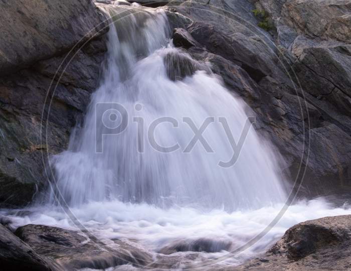Long Exposure Shot Of A White Waterfall