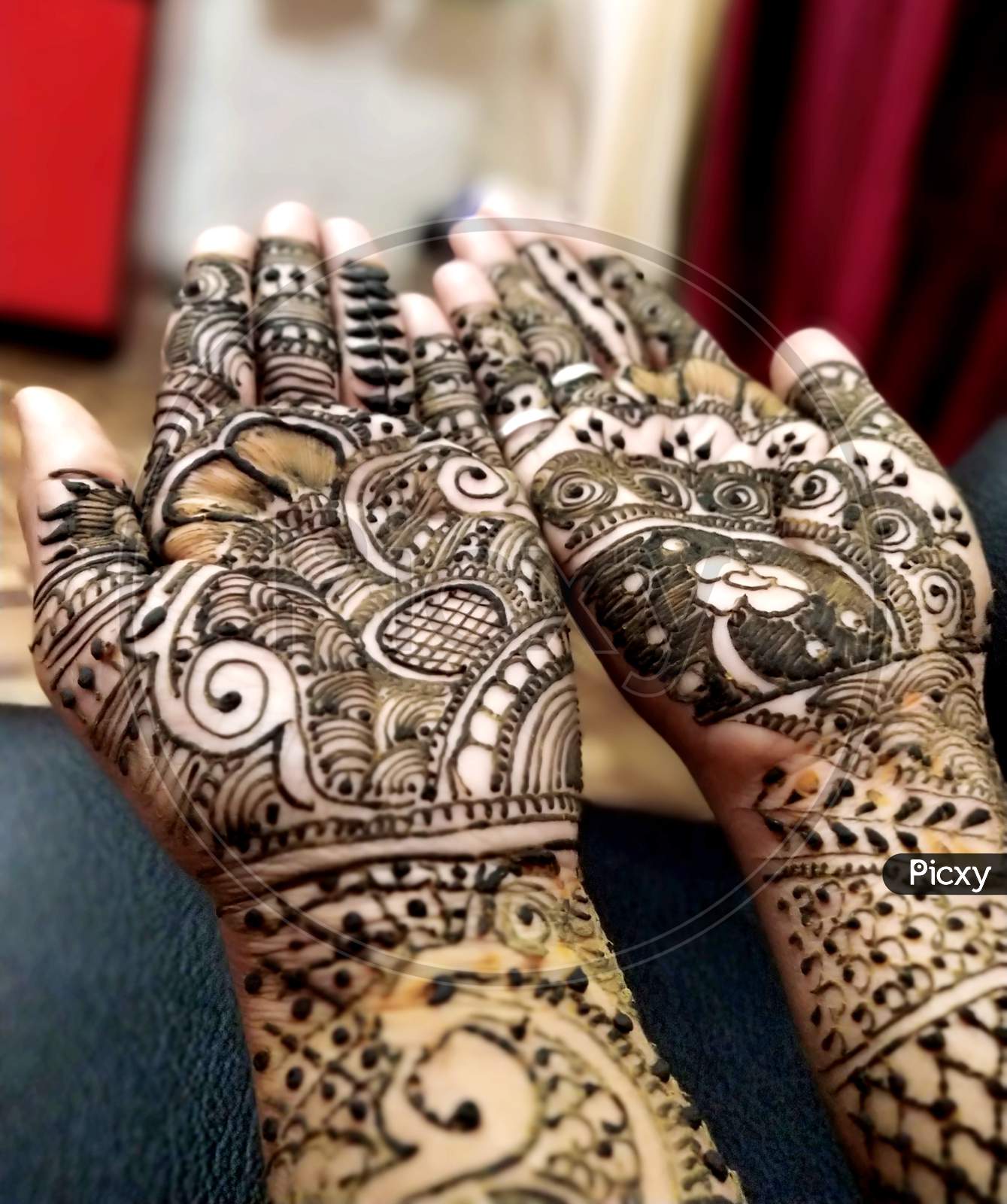 Beautifully Decorated Indian Hands With Mehandi Typically Done For Weddings