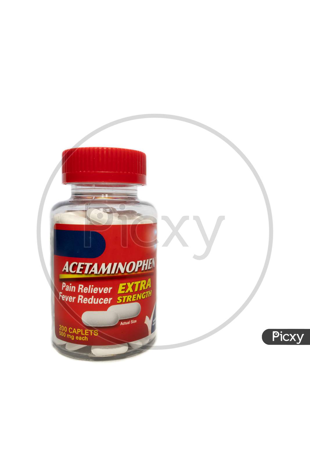 Red Acetaminophen Bottle Full Of Pills On A White Background.
