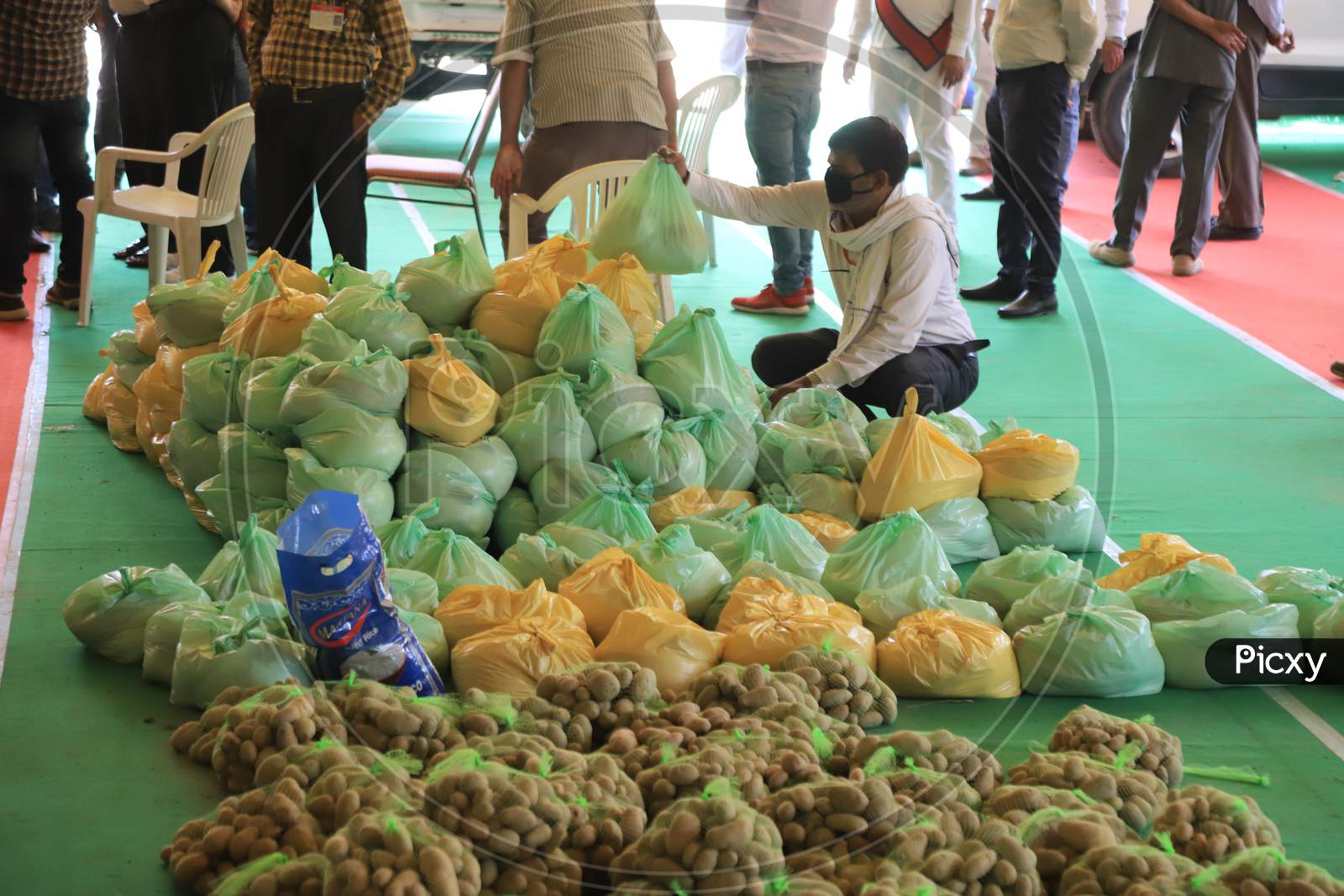 image-of-government-employees-loading-food-bags-for-distributing-them