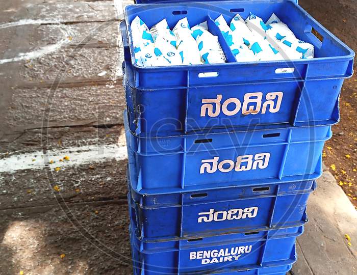 Crates of Nandini Milk packets