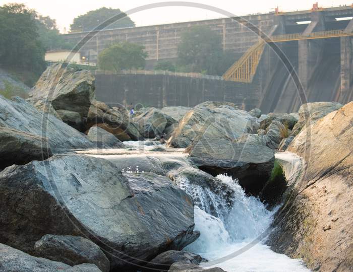 Waterfall Between The Rocks In Maithon Dam