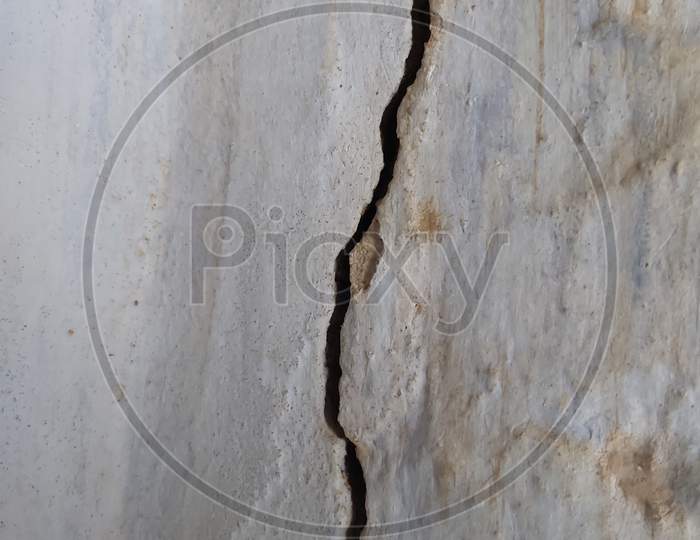 Heavy Crack in the old wall background.