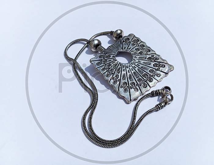 Ethnic white metal jewelry which is alloy of many metals.