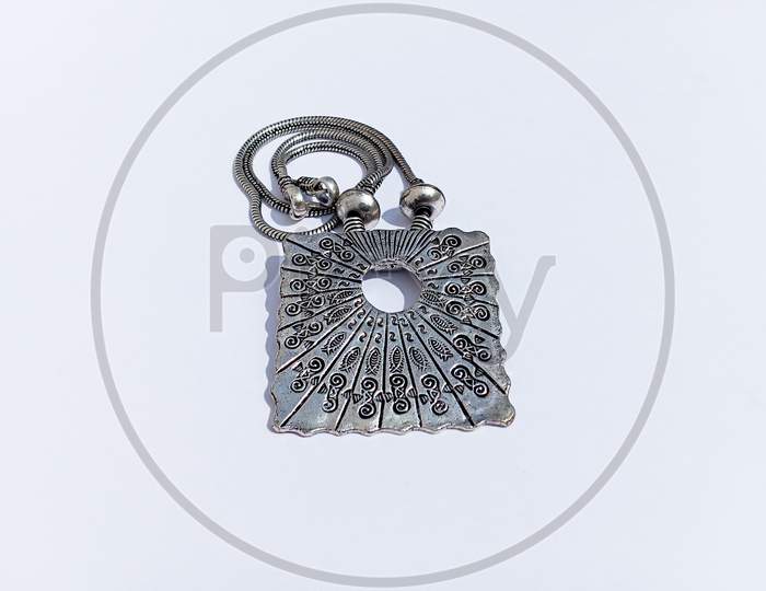 Ethnic white metal jewelry which is alloy of many metals.