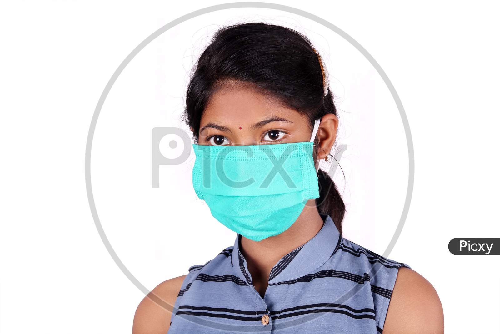 Young Woman wearing Virus Protection Mask to stop the spread of coronavirus or Covid-19