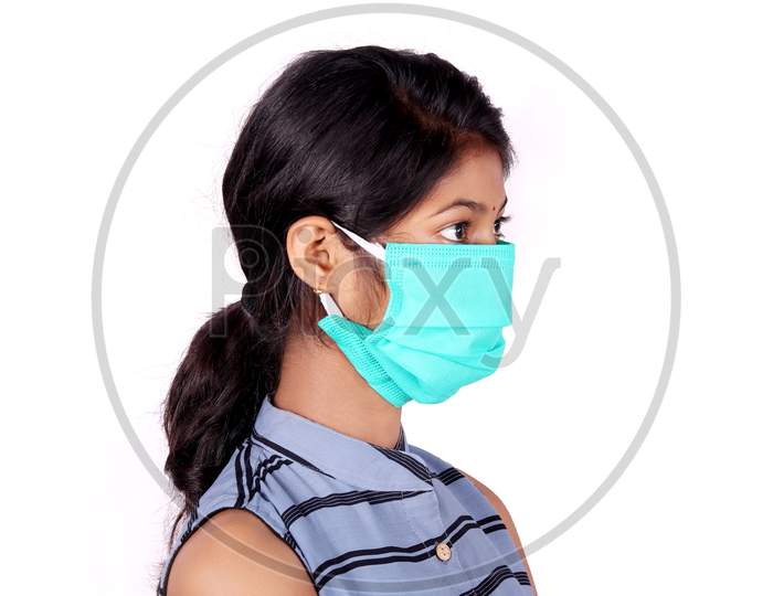 A Woman Wearing mask to stop the spread of corona virus or Covid-19