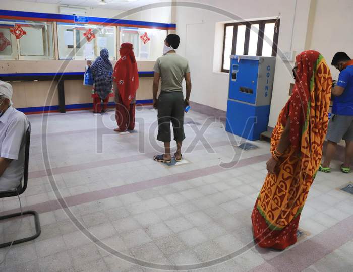 People Withdraw Money Inside  A Bank During A Nationwide Lockdown To Slow The Spreading Of The Corona virus Disease (Covid-19), In Prayagraj, April, 15, 2020.