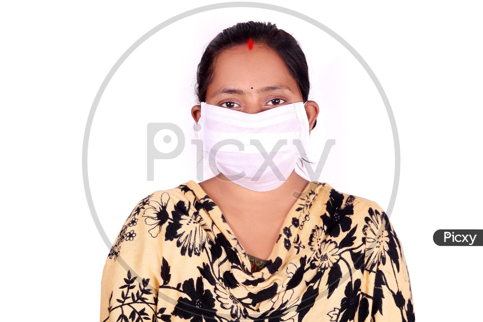 A Woman Wearing mask to stop the spread of corona virus or Covid-19