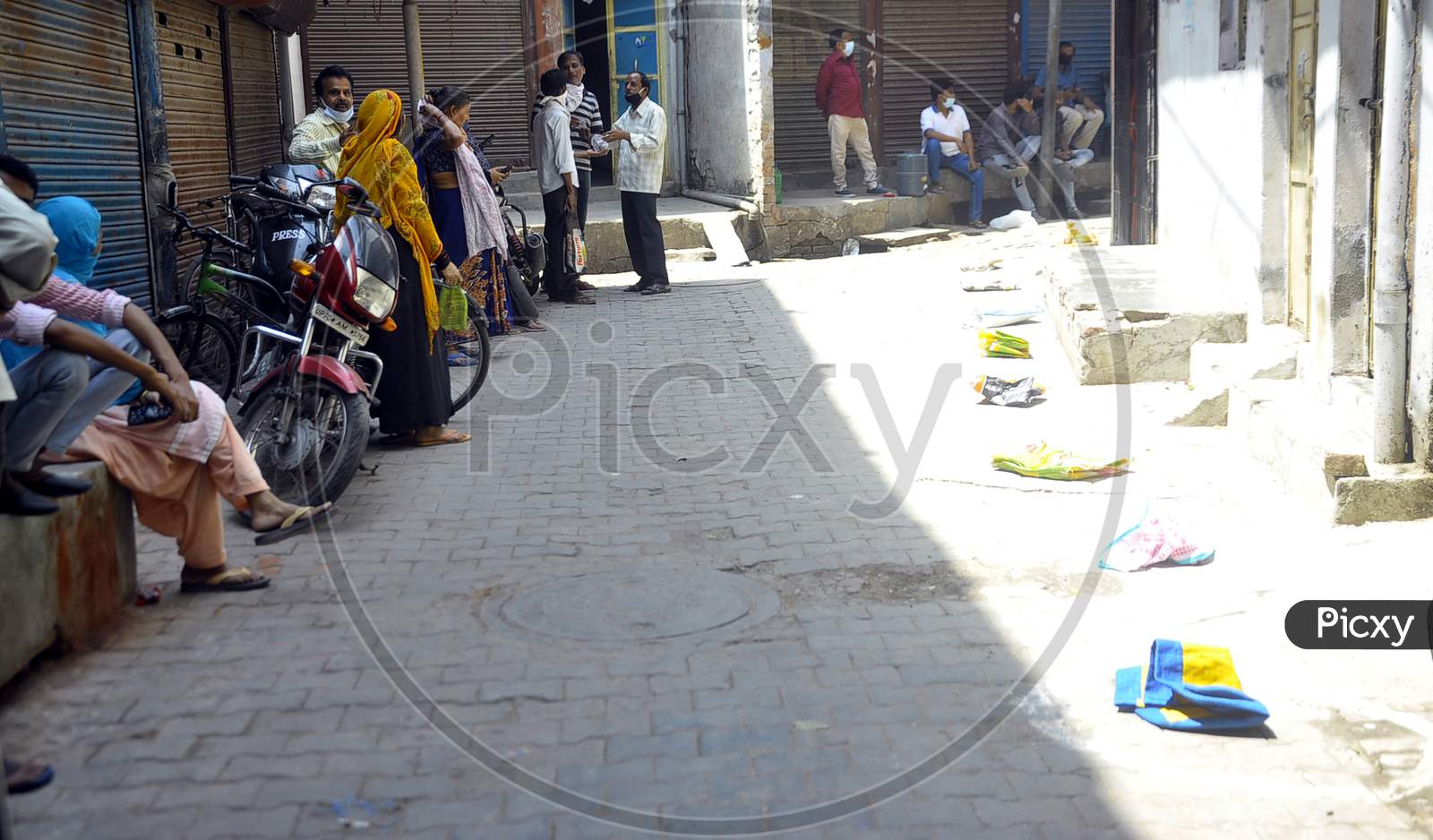 People Waiting Outside of a Government  Ration  Shop During A 21-Day Nationwide Lockdown To Limit The Spreading Of Coronavirus Disease (Covid-19), Prayagraj, April 4, 2020