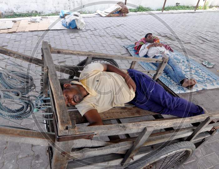 Labourers  Sleep At A Railway Station During A Nationwide Lockdown Imposed In The Wake Of Coronavirus or COVID-19  Pandemic, In Guwahati Thursday, 16 April, 2020.