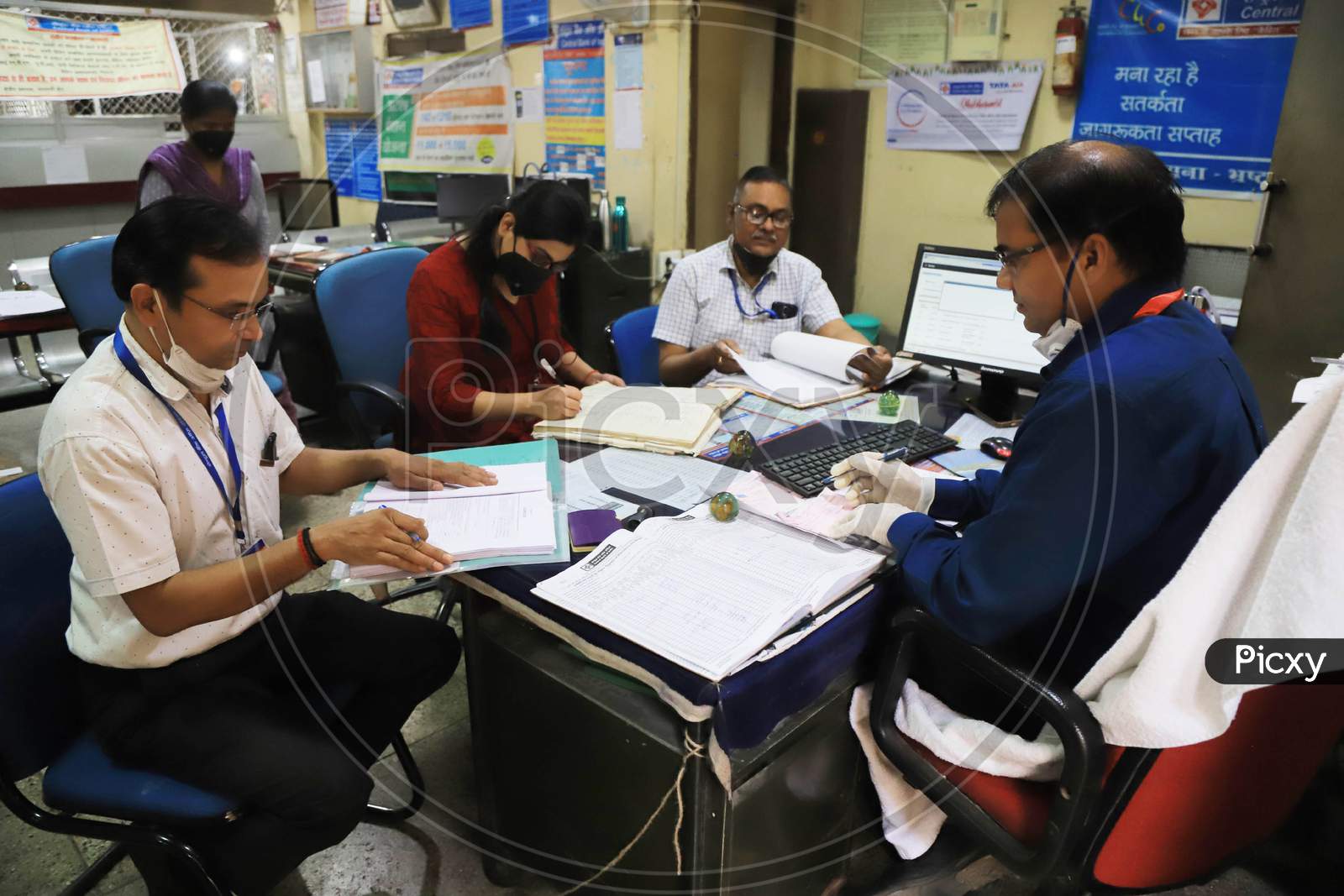 Bank Employees Busy Auditing Inside A Bank During A Nationwide Lock down To Slow The Spreading Of The Corona virus Disease (Covid-19), In Prayagraj, April, 16, 2020