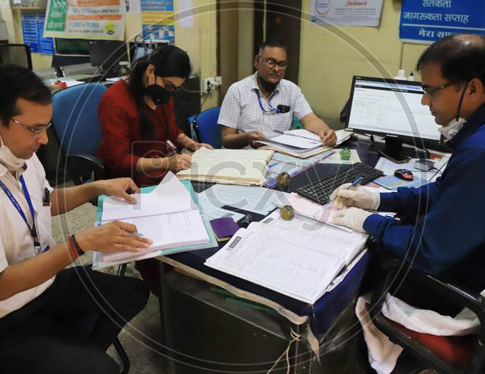 Bank employees Busy Auditing Inside Bank During Lockdown Period For Corona Virus Or COVID-19 Pandemic in Prayagraj.India
