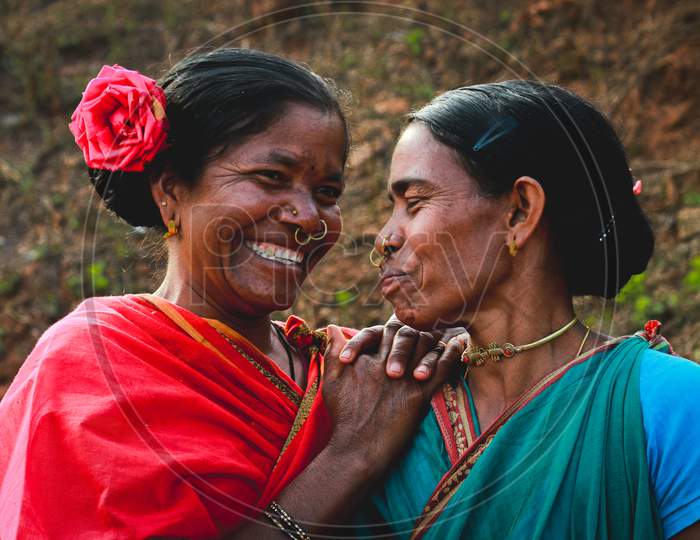 tribal women laughing 