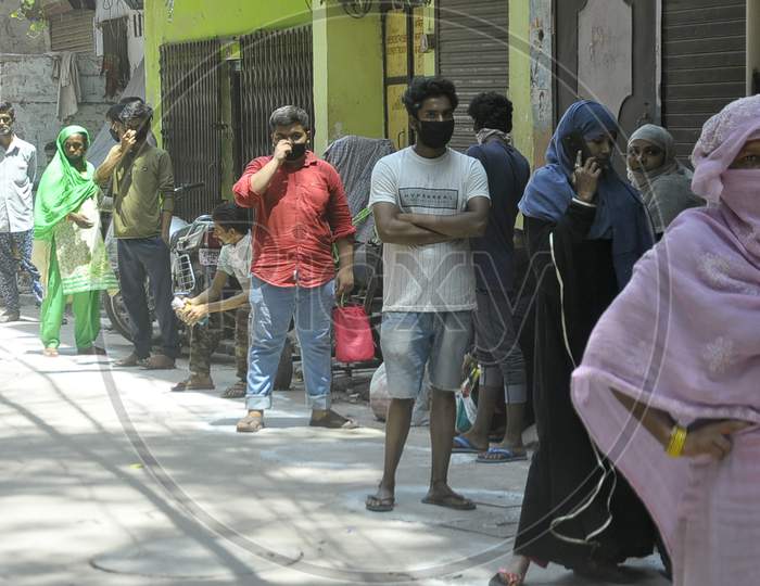 People Waiting Outside of  A Government  Ration  Shop During A 21-Day Nationwide Lockdown To Limit The Spreading Of Coronavirus Disease (Covid-19), Prayagraj, April 4, 2020