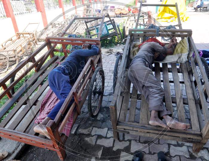 Labourers Sleep At A Railway Station During A Nationwide Lockdown Imposed In The Wake Of Coronavirus or COVID-19  Pandemic, In Guwahati Thursday, 16 April, 2020.
