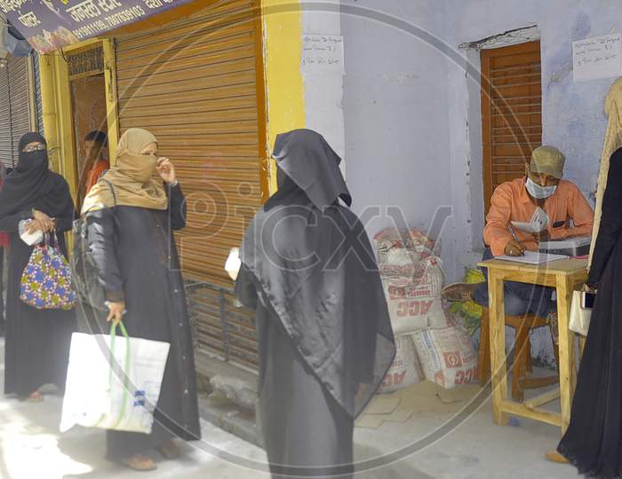 People Waiting Outside of a Government  Ration  Shop During A 21-Day Nationwide Lockdown To Limit The Spreading Of Coronavirus Disease (Covid-19), Prayagraj, April 4, 2020