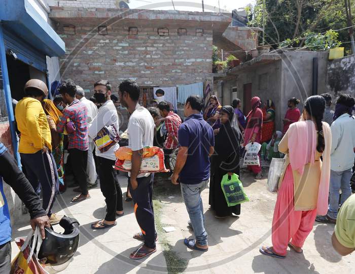 People Waiting Outside of Government  Ration  Shop During A 21-Day Nationwide Lockdown To Limit The Spreading Of Coronavirus Disease (Covid-19), Prayagraj, April 4, 2020