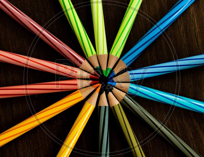 Color Pencils as a group On black Background close up