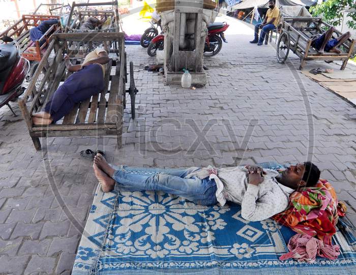 Labour Sleeps At A Railway Station During A Nationwide Lockdown Imposed In The Wake Of Coronavirus or COVID-19  Pandemic, In Guwahati Thursday, 16 April, 2020.