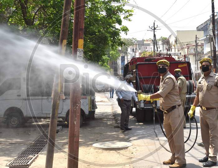 Fire man Sprinkling Disinfectant Water On the Streets For Corona Virus (COVID-19)  Spread Eradication in Prayagraj