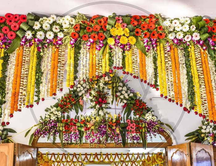 Gate of a temple of India decorated by flower