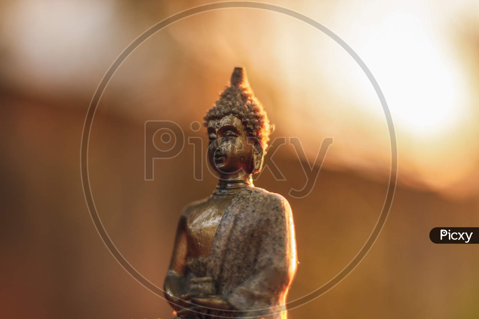 Golden statue of Meditating Buddha.