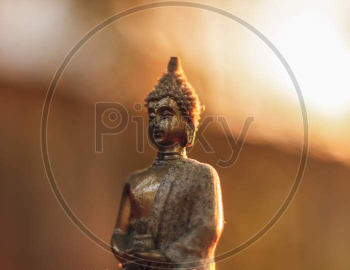 Golden statue of Meditating Buddha.