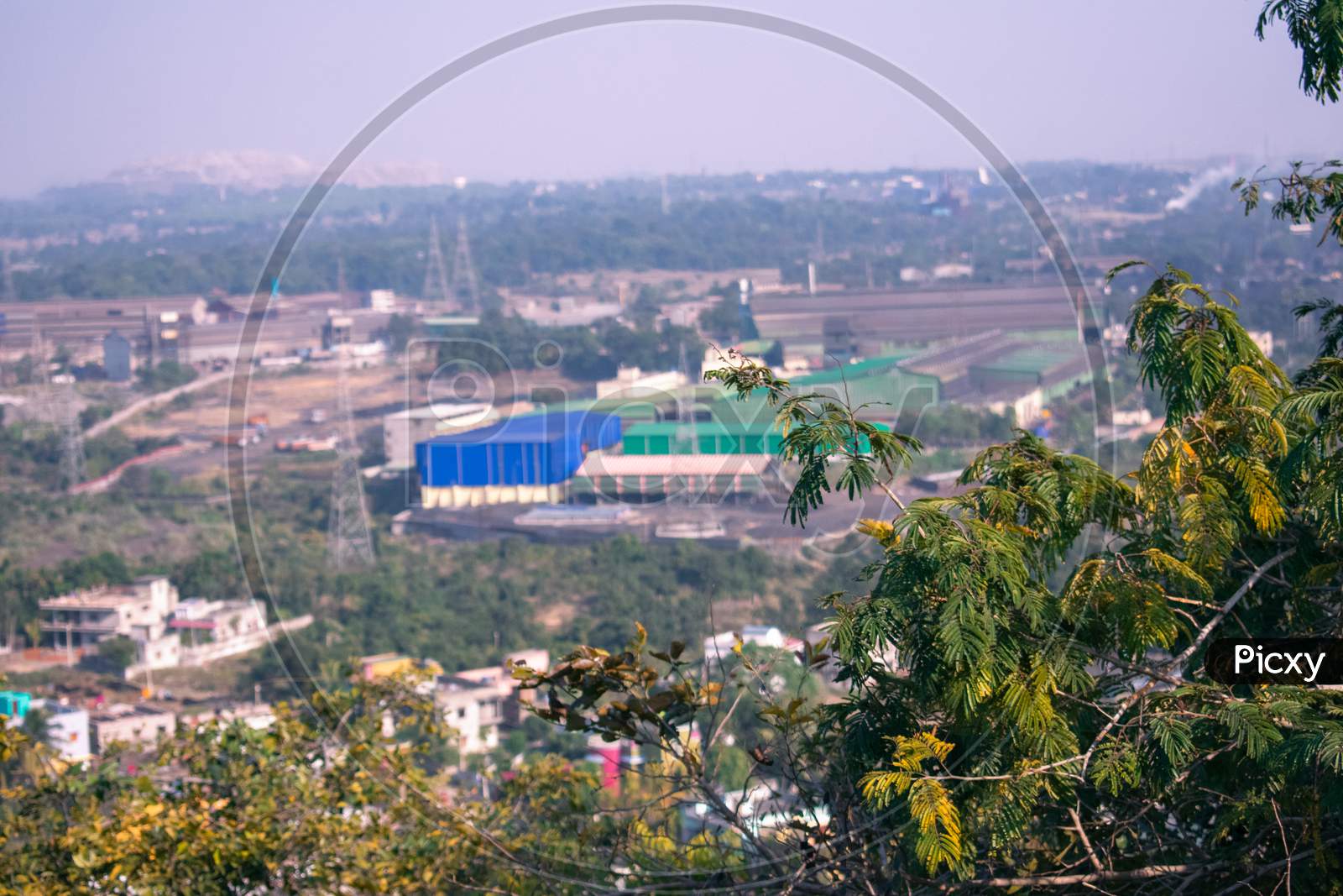 View Of Industrial Area Captured From Top Of A Hill