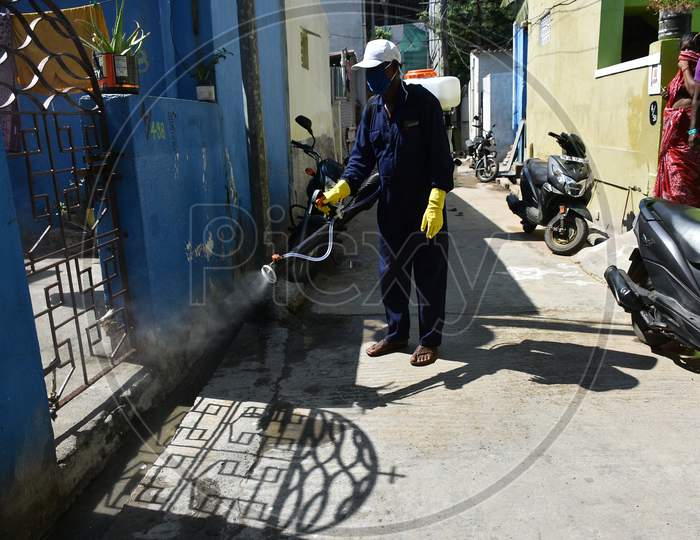 The health department staff spray medicines on the streets of chennai to protect people from covid 19 or coronavirus