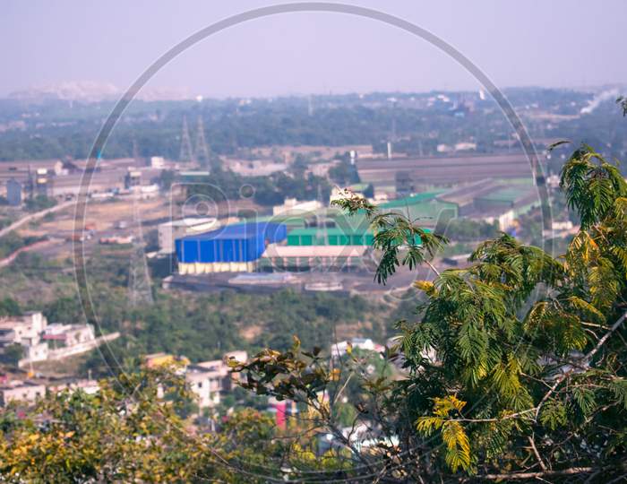 View Of Industrial Area Captured From Top Of A Hill